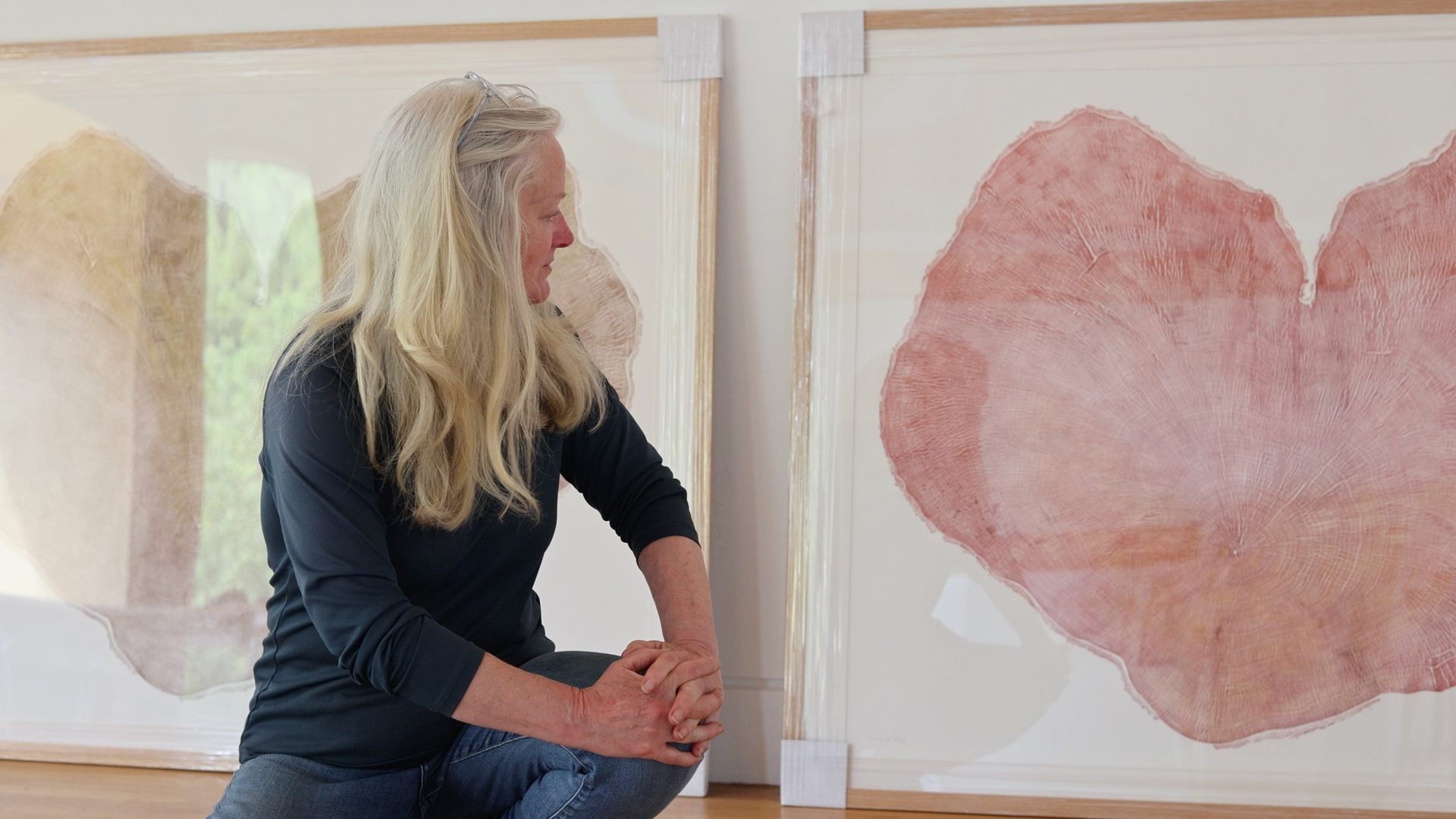 Printmaker Shona Branigan With The Heartwood Prints She Created From A Disc Of The Felled Sycamore Gap Tree © Shona Branigan